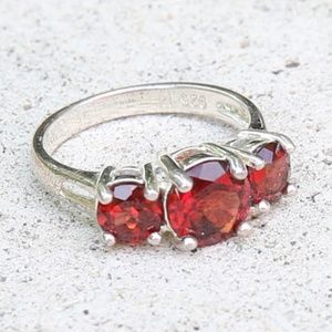Sterling Silver Three Stone Round Garnet Ring